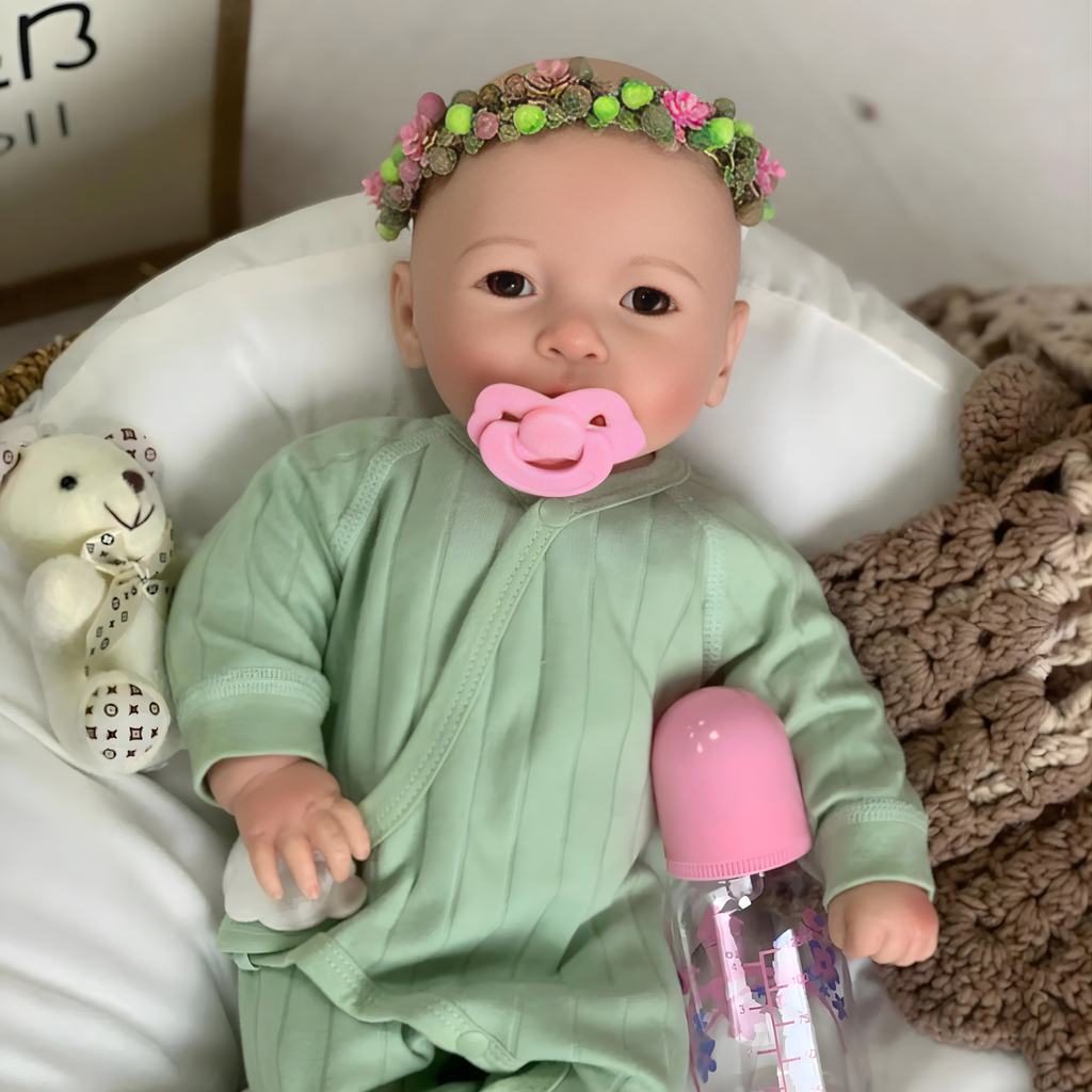 13" Realistic Full Silicone Baby Doll – Lifelike Newborn Girl in Green Pajama with Flower Headband, Pacifier & Bottle